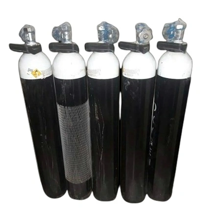 Image of an Islam Oxygen Cylinder Refill station. The station is a well-lit and organized facility with multiple refill stations and storage tanks labeled 'Islam Oxygen' in prominent signage. Staff members wearing uniforms are seen attending to customers, refilling their empty oxygen cylinders. The image showcases the availability of oxygen cylinder refill services provided by Islam Oxygen, emphasizing their presence in the market for oxygen supply.